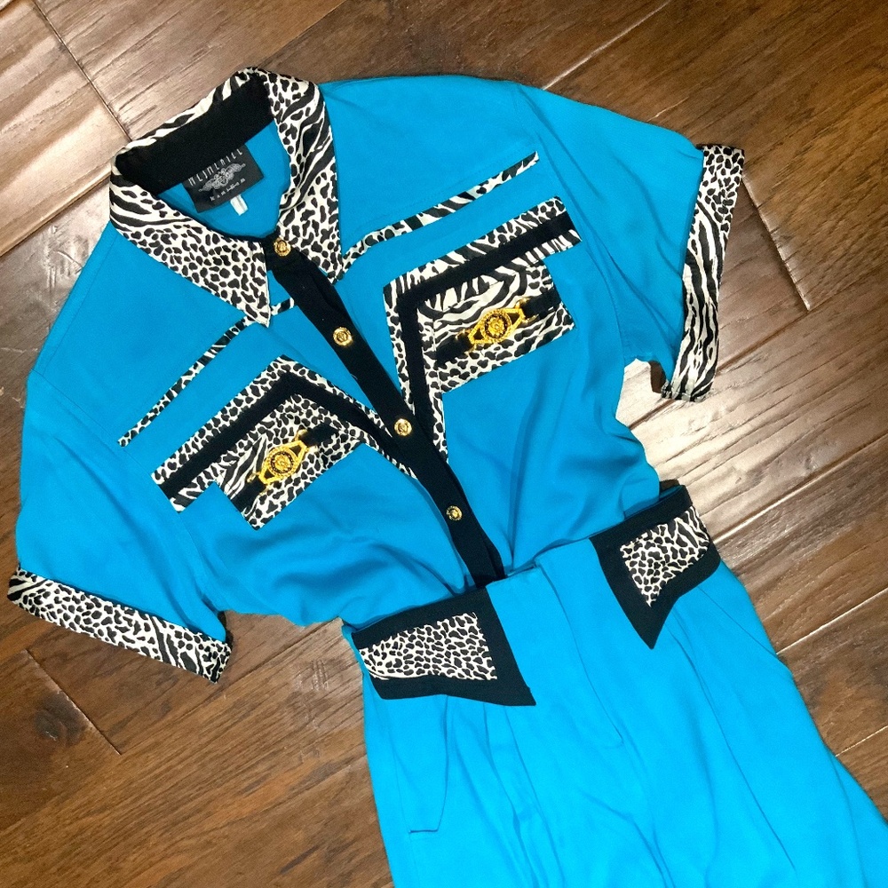 2 piece lined short set, turquoise with animal print detail. Small size